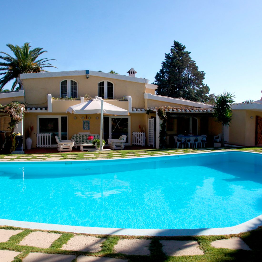 side of the Villa facing the pool, tennis court and part of the garden