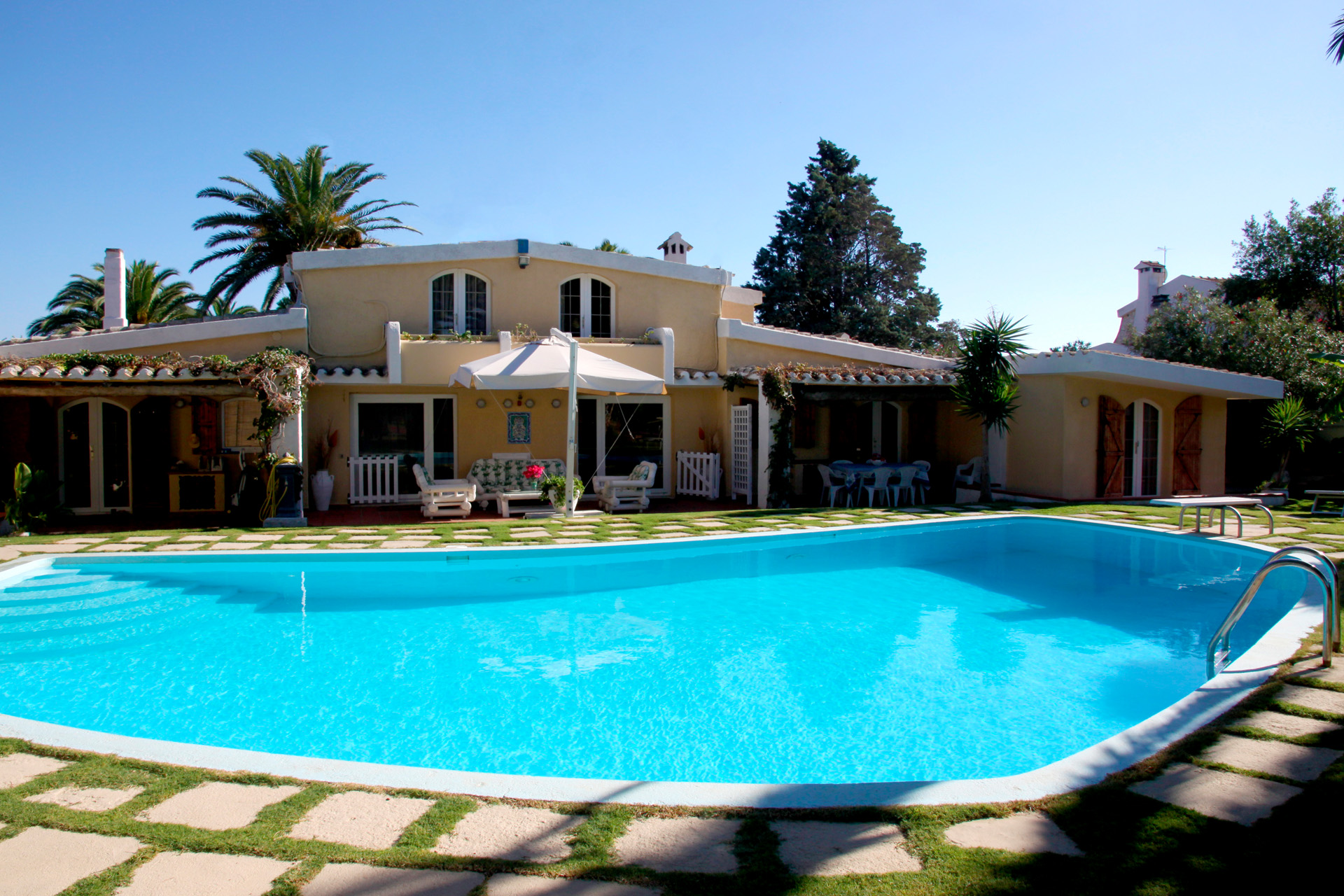 side of the Villa facing the pool, tennis court and part of the garden